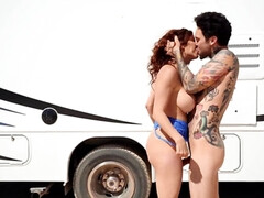 Inked stud bangs busty MILF in his RV and under the sun