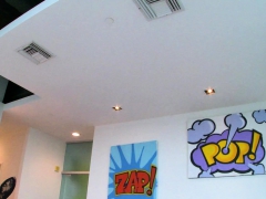 Dressed in a sexy red fishnet bodysuit, Marley Brinks