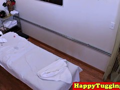 Asian masseuse jerking and riding on client