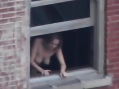 Lusty chick has a thing for getting ravaged at the window, in the middle of the day