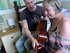 Shooting Starr Taking Guitar Lesson