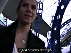 Brunette's mouth filled with cum after a steamy photoshoot with big tits and sexy earrings