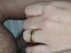 Stepmothers hand slides on her stepsons leg near his cock in bed