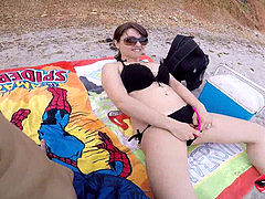 phat melons youthfull girl makes handjob on public beach / Miriam Prado