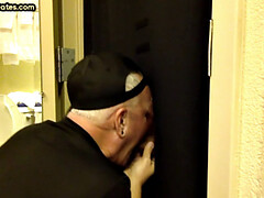 Gloryhole amateur DILF sucks penis at his home
