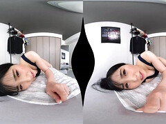Asian beauty enchants with daring, sensual POV virtual play.
