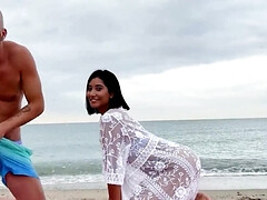 Reality scene with a brown skinned beauty fucking at the beach