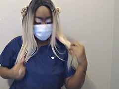 Masked ebony nurse