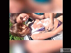 Abbie Maley and her gf are sucking together a massive dick