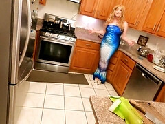Busty blonde woman is fucked deep in the kitchen