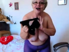 Granny playing with  big boobs on webcam! Amateur!