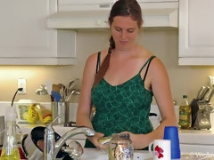 In the kitchen, Lindsay masturbates and plays alone
